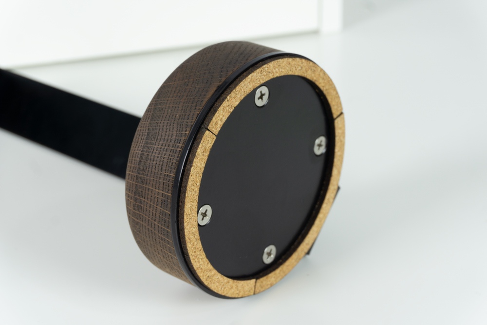 Wooden headphone stand - Walnut finish, cork base closeup
