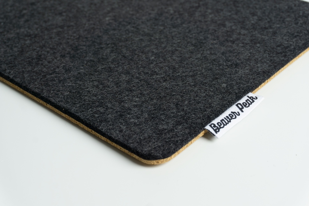 Close up of black merino wool felt and cork material