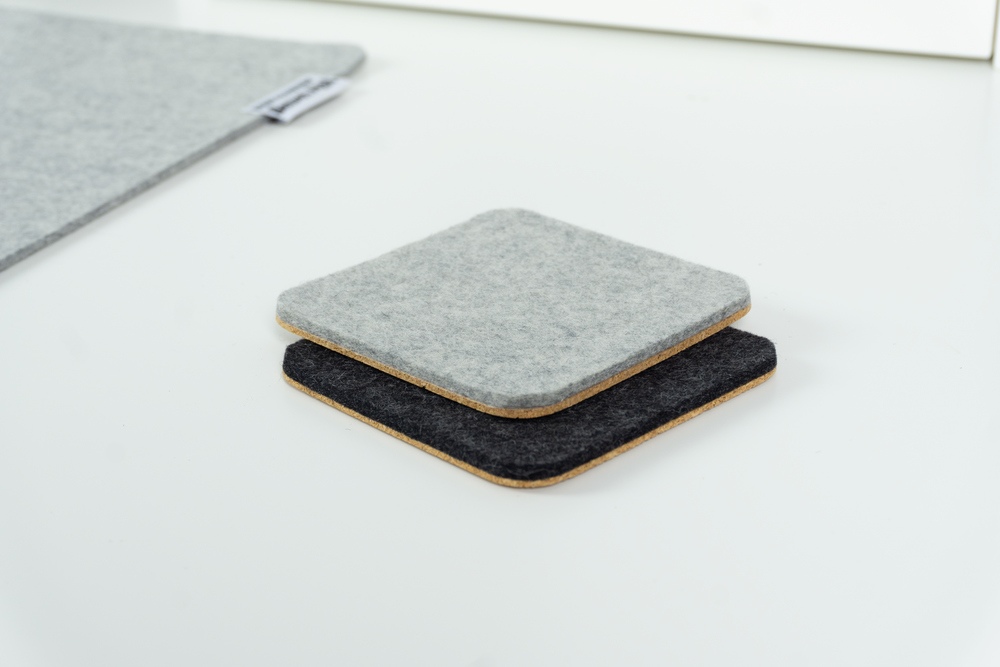 Merino wool felt coasters, comparison of dark and light shades. Round corners on both