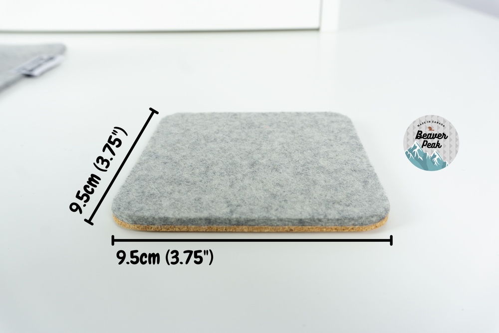 Single grey wool coaster with size labels