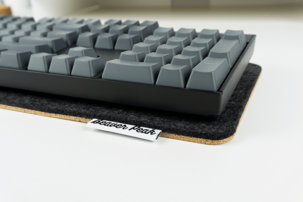 Wool keyboard mat - Charcoal, closeup of keyboard on mat - Beaver Peak