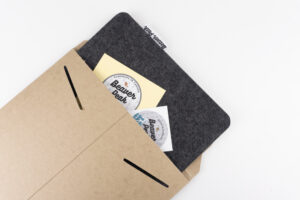 Black wool felt mouse pad packaging, recyclable packaging only.