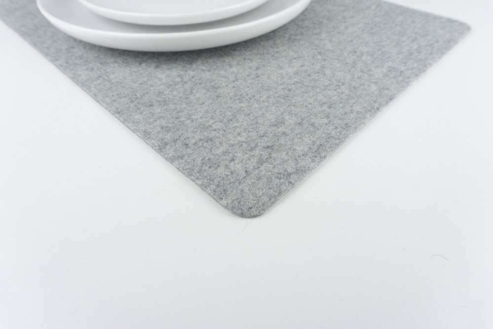 Closeup of merino wool felt placemat - grey no logo.